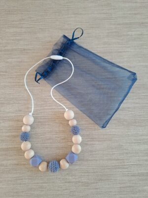 1-57 (1) Collier d'allaitement, de portage et de dentition.